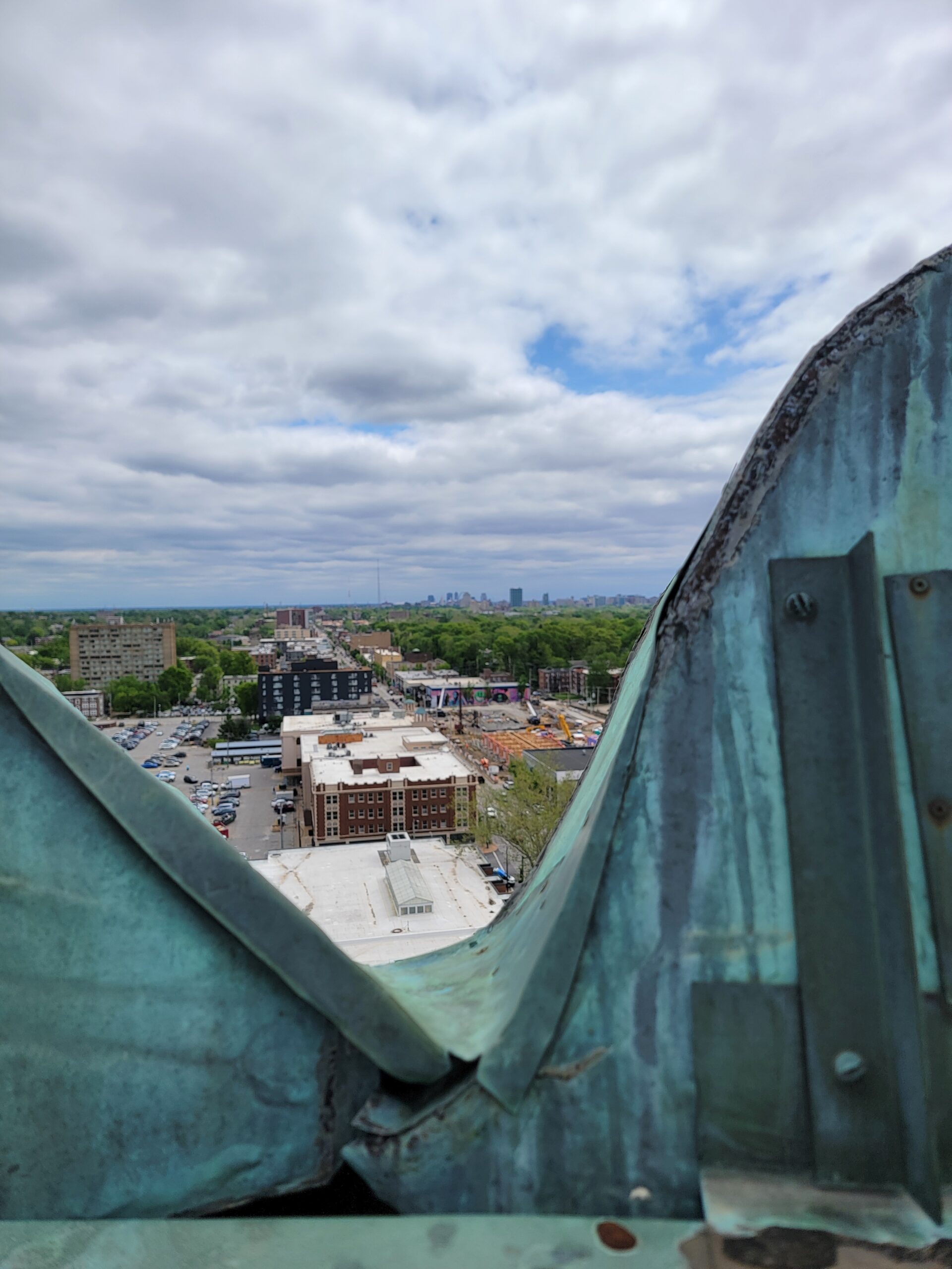 Downtown in the distance.   The light has lit up the Arch in the past.